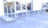 Fence Gallery Photo - aluminum pipe rail at steps.jpg